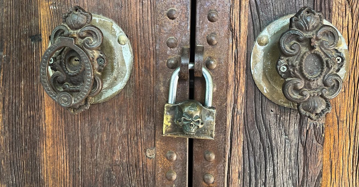 locksmith unlocking front door — Evanston Locksmith Inc